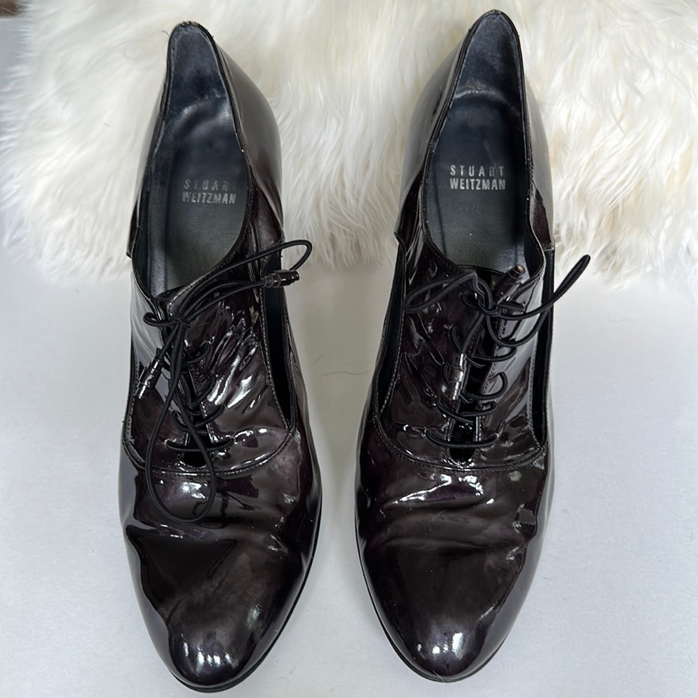 Dark purple Stuart Weizman size 9.5 3-inch heels. Light wear